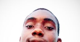 Portrait of a young man smiling, representing the spirit of Buddy DML Official (TRENCHKID TM) and confident expression.