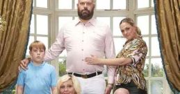 Main cast of 'King Gary' posing on a couch, showcasing the comedy series' family dynamics and humor in a lavish setting.