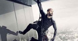 Action-packed scene from *Mechanic: Resurrection* featuring a daring stunt by Jason Statham.