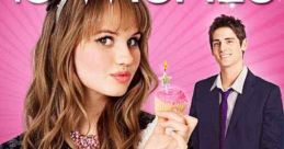 Abby holds a pink cupcake with a birthday candle, celebrating her sweet 16 in the magical movie "16 Wishes.