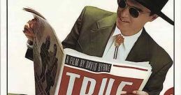David Byrne in a stylish hat reading a newspaper featuring "True Stories," highlighting the film's unique narrative style.