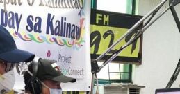 Filipino radio broadcast setup at Edge FM 92.9 MHz, featuring hosts and equipment in a vibrant studio environment.
