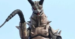 Gudon stands powerfully atop rocky terrain, showcasing its fierce spiked form and menacing presence. Perfect for collectors.