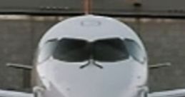 Swiss Bombardier CS100 at SR Technics, showcasing modern aircraft design and advanced aviation technology.