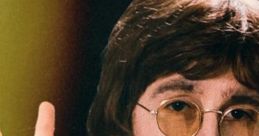 Adam Hastings - The John Lennon Guy Adam Hastings is a highly acclaimed John Lennon impersonator and lookalike, recognized