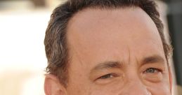 Tom Hanks smiling at a red carpet event, showcasing his charisma and charm, a beloved figure in Hollywood filmmaking.