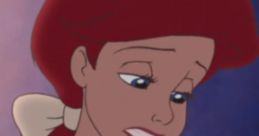 Ariel gently cradles her baby, showcasing her protective nature in "The Little Mermaid II: Return to the Sea.