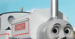 Stanley the Silver Engine with a cheerful smile, showcasing vibrant red wheels and detailed features, from TGD-S12 series.