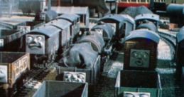 Troublesome Trucks from TTTE model series with expressive faces lined up on a railway, ready for an adventure.