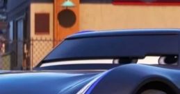 Close-up of a sleek, black racing car featuring blue accents, designed to resemble Jackson Storm from "Cars.