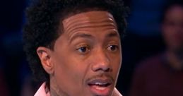 Nick Cannon surprised audience members while hosting "Beat Shazam," showcasing his signature style and engaging personality.