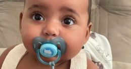 Cute baby with a pacifier and bottle, sitting on a couch, showcasing innocence and charm—perfect for family horror themes.