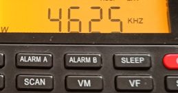 Digital radio display showing frequency 46.25 KHz with various control buttons for tuning and settings.