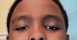 A young boy smiles confidently, showcasing his personality and the power of expressing his voice.
