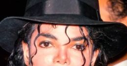 Michael J. Jackson with iconic hairstyle and hat, exuding timeless style and charm at a public event.