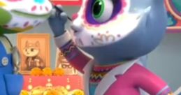 Kat the Mexican cat interacts with a colorful frog, showcasing a festive atmosphere perfect for Chetaboo and Gecko's Garage.