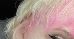 Young person with pink and blonde hair, showcasing vibrant hair color and natural makeup style, promoting self-expression.