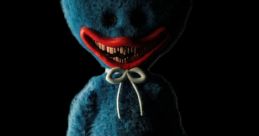 Nightmare Huggy Wuggy with menacing grin, eerie blue fur, and long limbs set against a dark background, evoking horror themes.