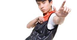 Young dancer in stylish outfit striking a dynamic pose, showcasing movement and energy, perfect for dance or film themes.