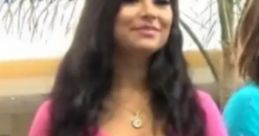 Pilar Gasca in a pink top, exuding charm and confidence, showcasing her vibrant personality for "Cumbia de Galaxy.