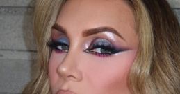 Glamorous makeup look featuring bold eyeshadow and soft lips, showcasing a chic hairstyle and stylish accessories.