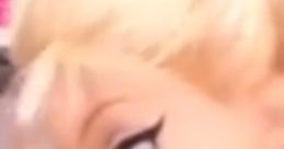 Close-up of a playful doll with blonde hair and blue eyes, perfect for fun stories on the Come Play With Me YouTube channel.