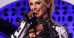 Harley Cameron performs in a stunning studded outfit, showcasing her edgy style and captivating stage presence.