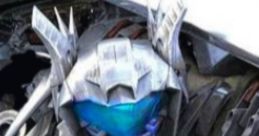 Close-up of Jazz from Transformers with metallic features and blue visor, showcasing his robotic design in the 2007 movie.