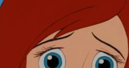 Ariel from The Little Mermaid, expressing sadness after losing her voice, showcasing big blue eyes and vibrant red hair.