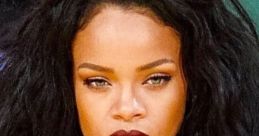 Robyn Rihanna Fenty with striking dark lipstick, showcasing her iconic style and captivating presence at an event.