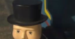 Sir Topham Hatt in a classic pose, wearing a top hat and suit, oversees the trains in the US version of the series.