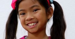 Smiling girl in a sparkly pink outfit with pigtails, embodying the fun of Emma Toys And Colors Playdate Adventures Season 1.
