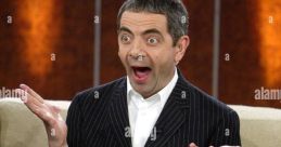 Rowan Atkinson (Comedian) Rowan Atkinson, an iconic figure in the world of comedy, has captivated audiences with his