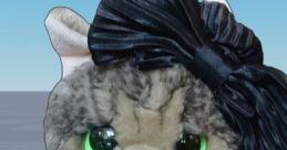 Adorable plush cat wearing a stylish outfit and a large bow, perfect for makers and craft enthusiasts.