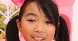 Cheerful girl in a sparkly pink outfit, showcasing the fun and creativity of Lucy Toys And Colors (2002-2003) Season 1-2.