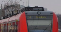 Red S-Bahn train labeled "S4 Kronberg" at a platform, part of the Rhein-Main transport network, showcasing modern rail travel.