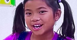 Cheerful girl in a cat-themed outfit smiles brightly, perfect for fans of Emma Toys And Colors, Santa’s Little Genies.