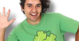 Uncle Jim in a bright green lettuce shirt, playfully waving with a vibrant pink backdrop, showcasing fun colors and toys.