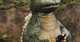 Little Godzilla stands playfully in a lush landscape, showcasing its charming features and classic design.