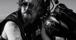 At Home In The Garage: Chibs Working On His Bike At Home 'At Home In The Garage: Chibs Working On His Bike At Home'