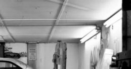 Garage: Getting To Work The ambient cape titled 'Garage: Getting To Work' captures the subtle of a gearhead engaged in