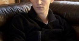 Tom Hiddleston And Rain: Sitting Next To Tom Reading Book In the ambient cape titled 'Tom Hiddleston And Rain: Sitting Next