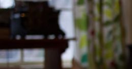 Rainy Evening At Home "Rainy Evening At Home" captures the serene ambiance of a family gathering during a quiet storm. The