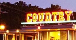Country Diner: The Special Today Is Aunt Millie's Biscuits And Gravy Small town diner in the middle of Texas. Cowboys,