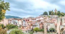 Medieval Town Morning: A Medieval Town Waking Up For The Day Experience the serene ambiance of a medieval town waking up as