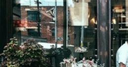 Breakfast In The City "Breakfast In The City" evokes the ambiance of a cozy summer morning in a charming coffee shop. The