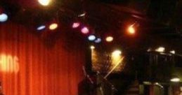 Jazz Club Crowded: A Crowded Jazz Club Experience the vibrant atmosphere of a crowded jazz club, where the of light