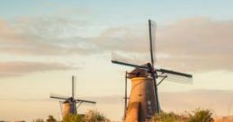 Windmill Atmosphere: Kinderdijk Windmill The Windmill Atmosphere: Kinderdijk Windmill captures the serene cape of the