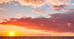 Watching A Sunset On The Beach: Watching a sunset on the beach offers a serene experience, combining the beauty of nature