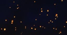 Watching Lanterns: A Peaceful Pocket Of Time "Watching Lanterns: A Peaceful Pocket Of Time" captures a serene moment amidst a